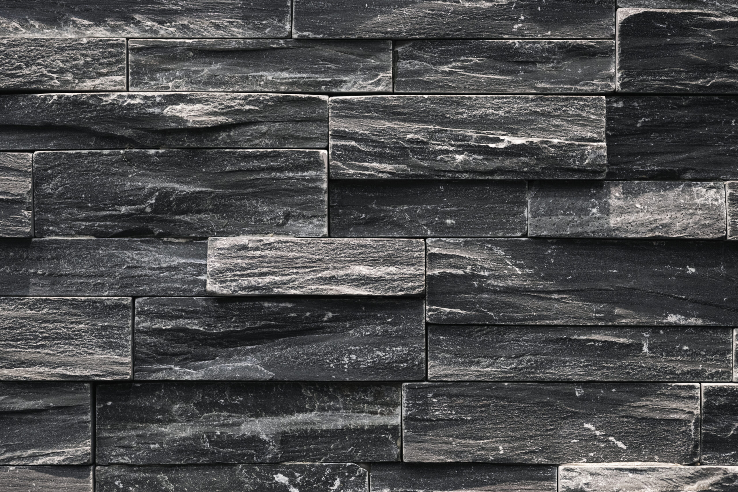 close-up-black-uneven-wall